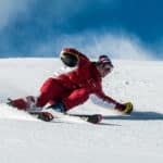 Man on ski board on snow field