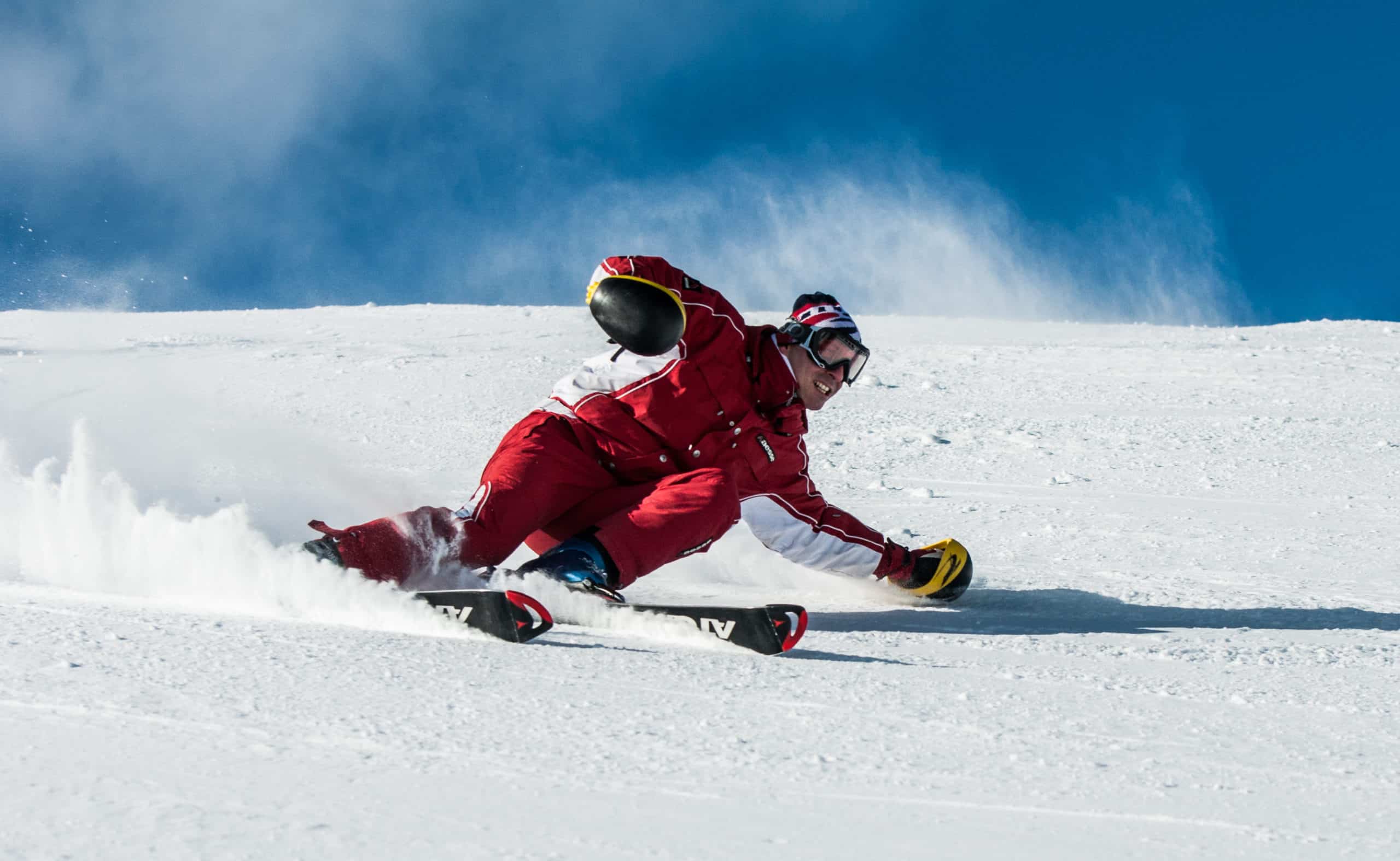 Man on ski board on snow field