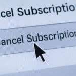 Termination concept with cursor clicking on cancel subscription button on digital screen representing end of service agreement