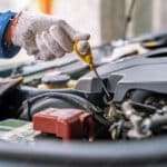 Auto mechanic working in the garage, Service and maintenance and car maintenance.