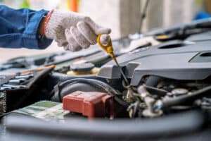 Auto mechanic working in the garage, Service and maintenance and car maintenance.