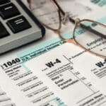 Paper blanks of 1040, w4 and w9 tax form close up