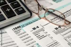 Paper blanks of 1040, w4 and w9 tax form close up